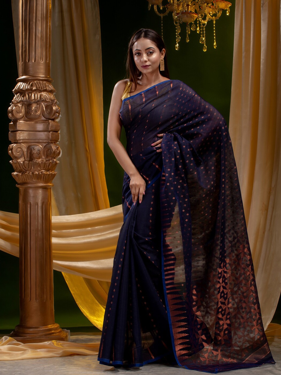 

Mitera Navy Blue & Copper-Toned Ethnic Motifs Zari Silk Cotton Heavy Work Saree