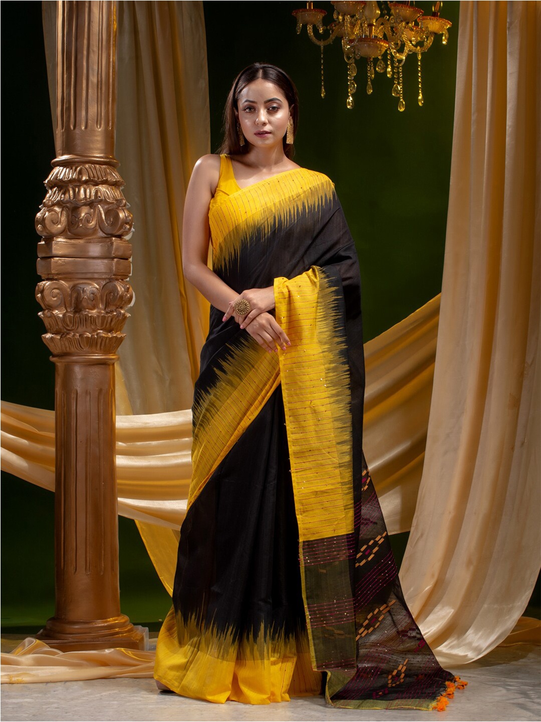 

Mitera Black & Yellow Tie and Dye Sequinned Silk Cotton Saree