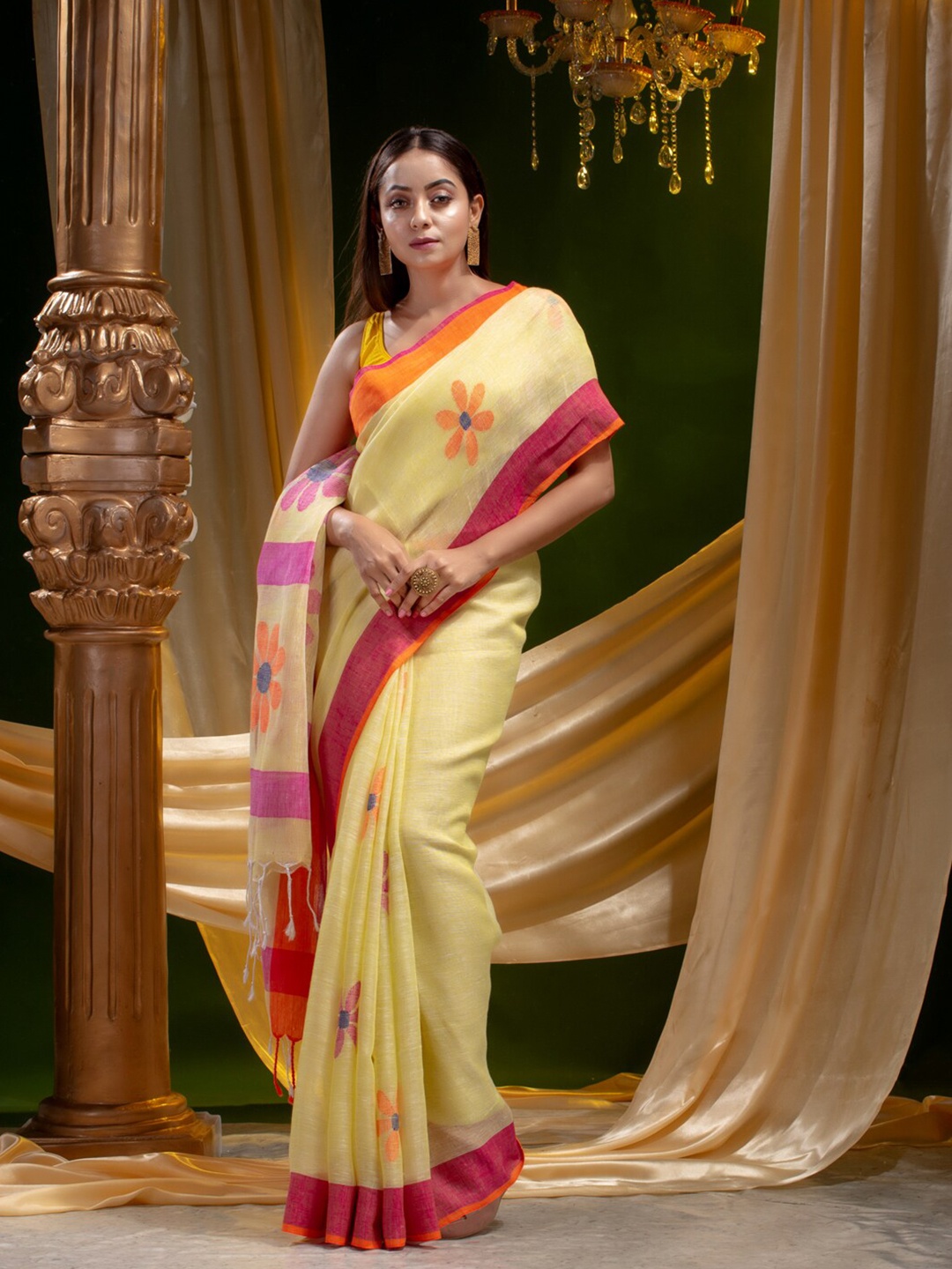 

Mitera Women Yellow & Orange Floral Pure Linen Heavy Work Saree