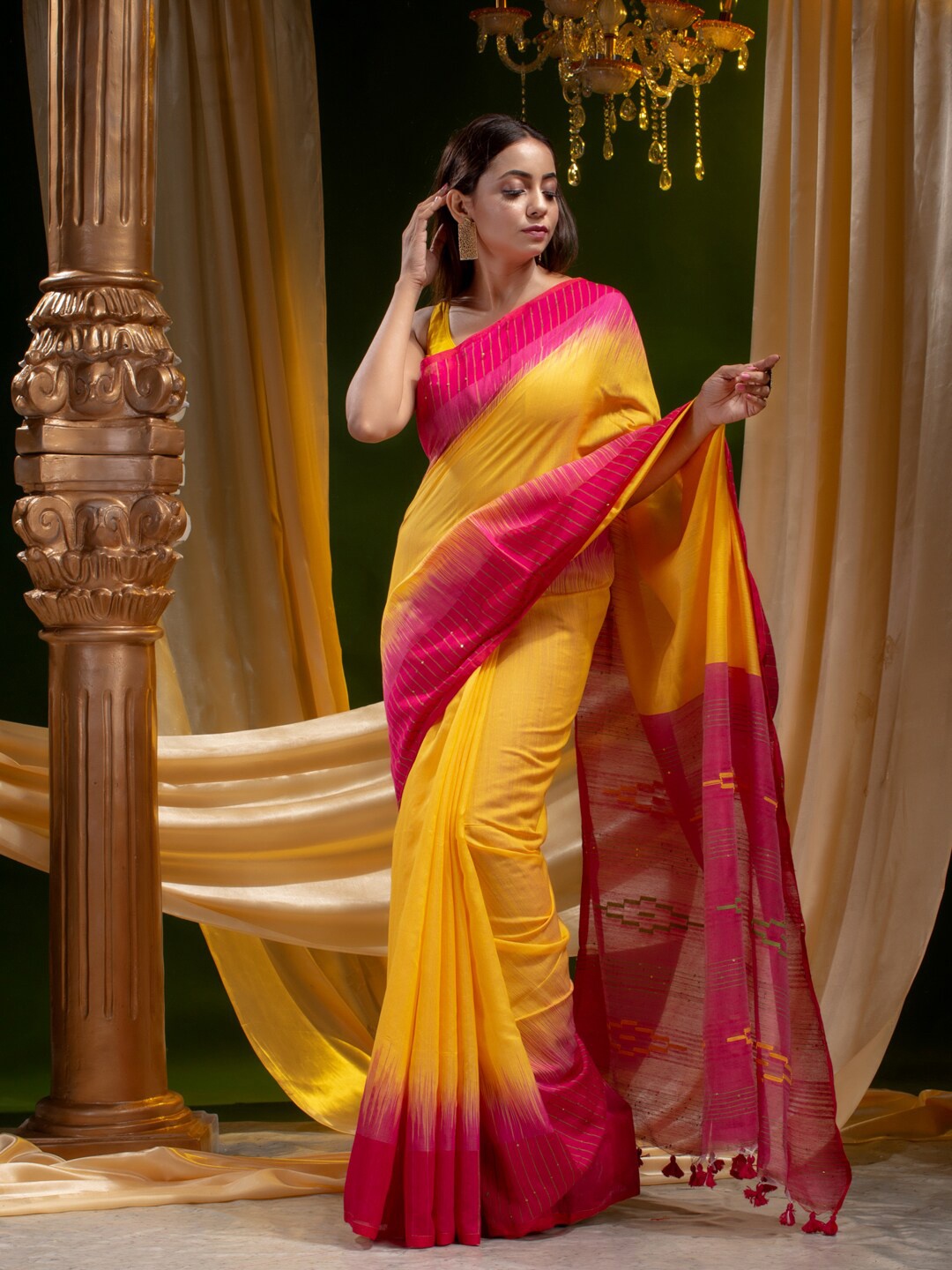 

Mitera Yellow & Pink Ethnic Motifs Silk Cotton Saree