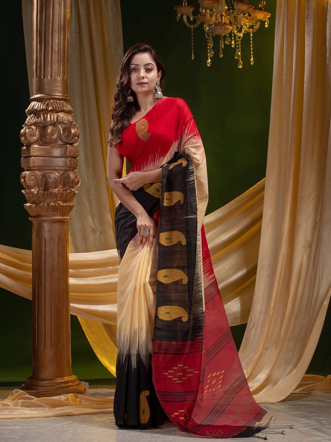 

Mitera Beige & Black Woven Design Silk Cotton Heavy Work Saree