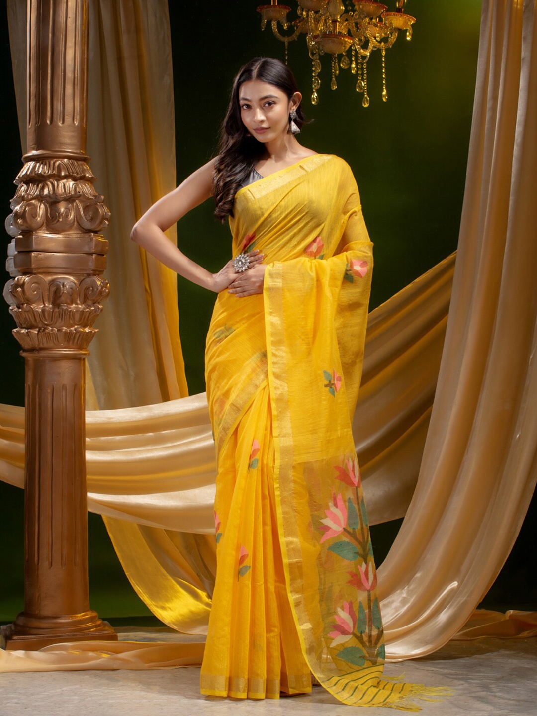 

Mitera Yellow & Green Ethnic Motifs Silk Cotton Zari Saree