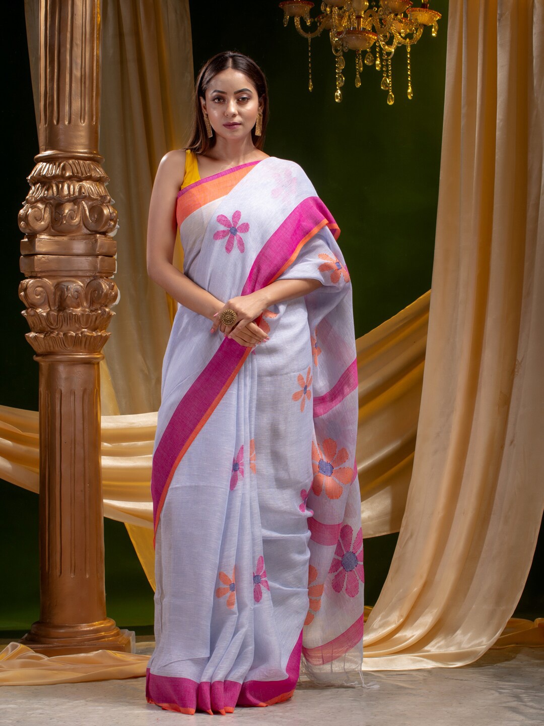 

Mitera Blue & Pink Woven Design Pure Linen Heavy Work Saree