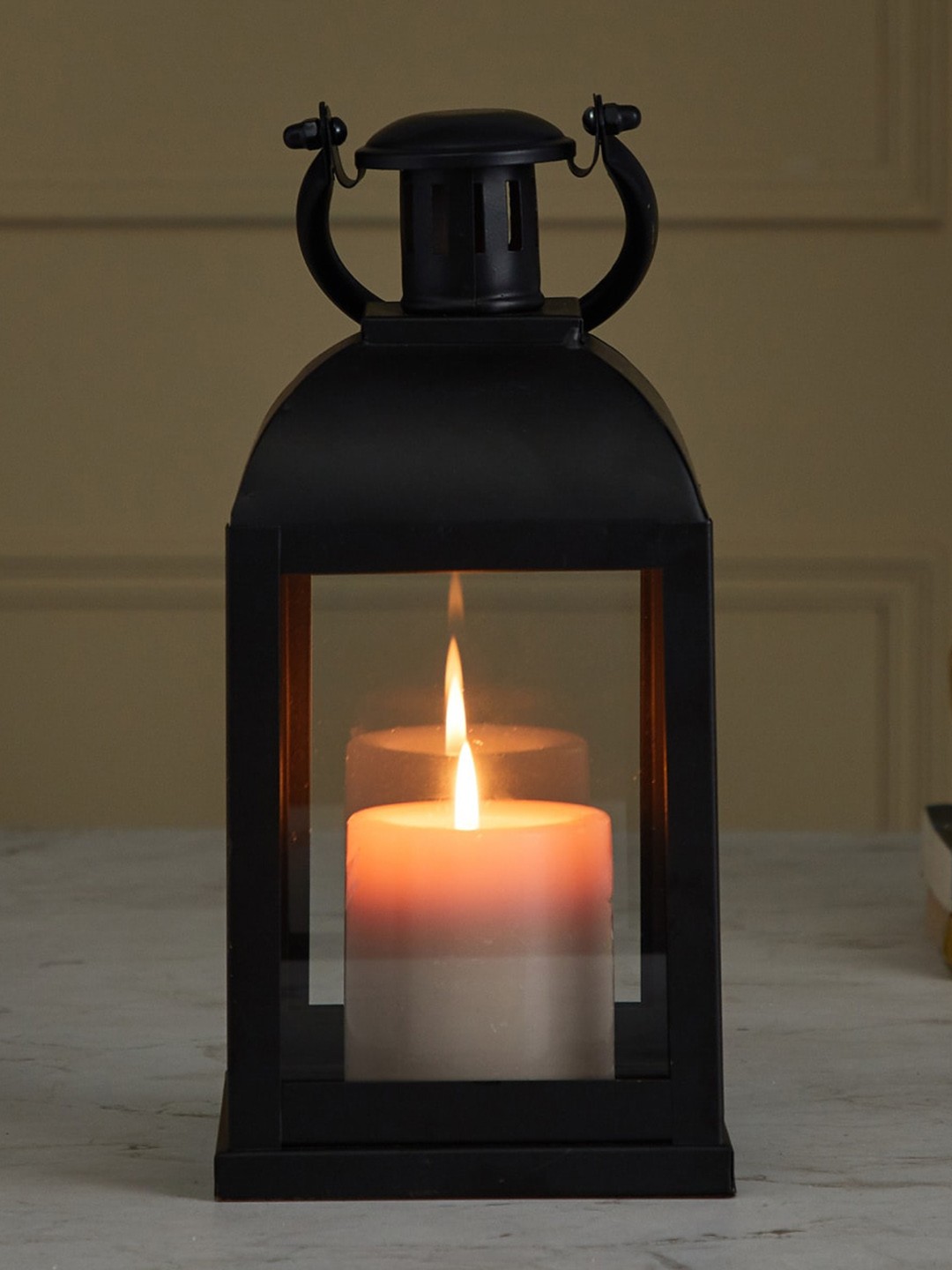 

Home Centre Black Solid Glass Hanging Lantern Candle Holders