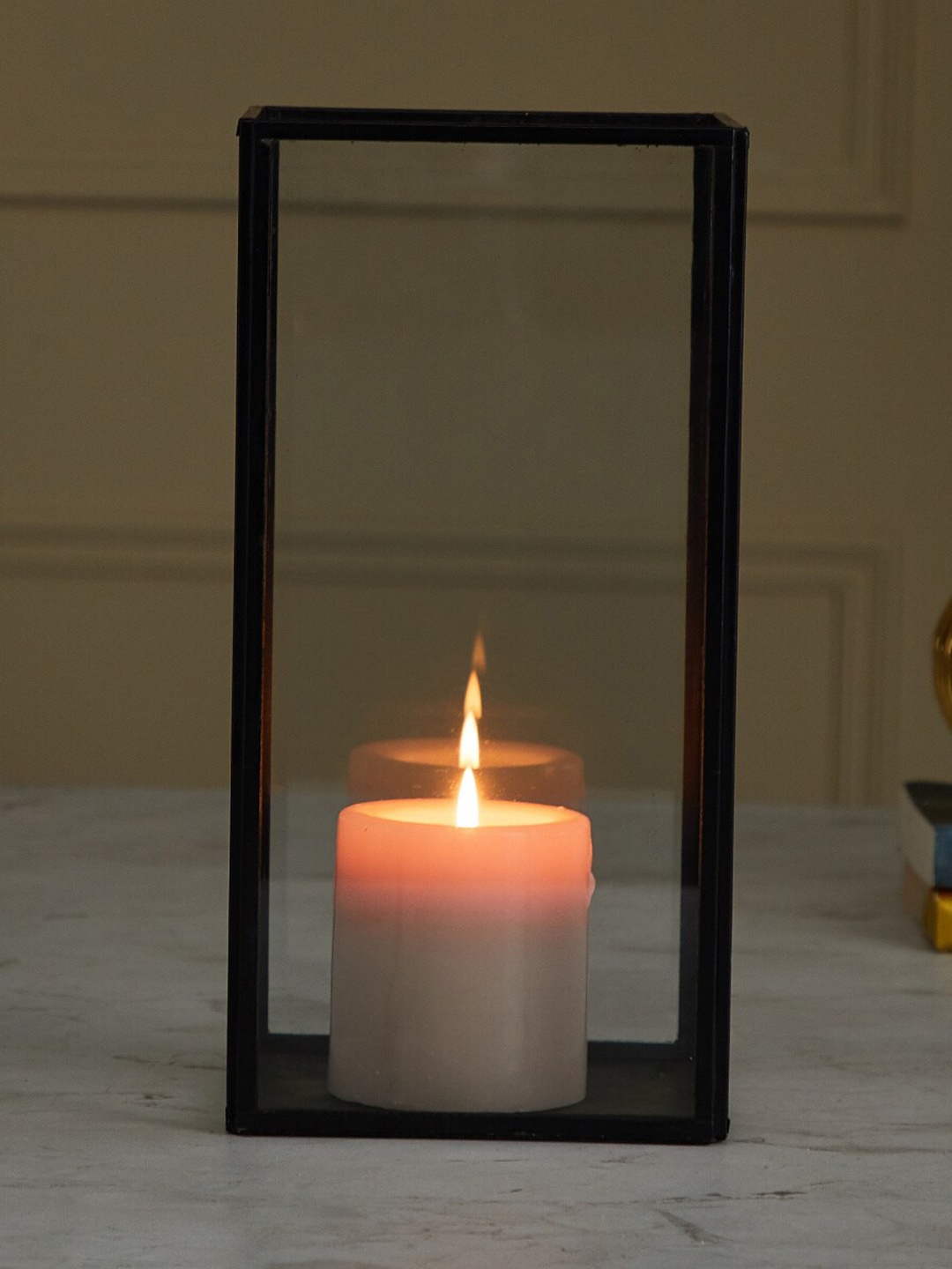 

Home Centre Black Transparent Glass & Iron Candle Holders