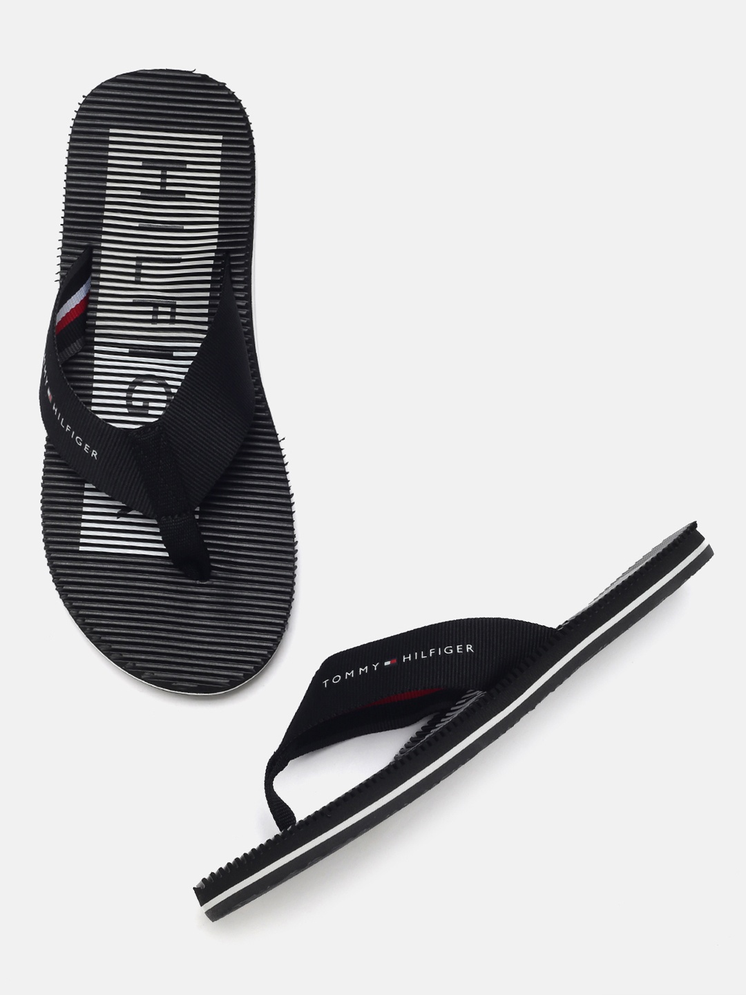 

Tommy Hilfiger Men Black Printed Thong Flip-Flops