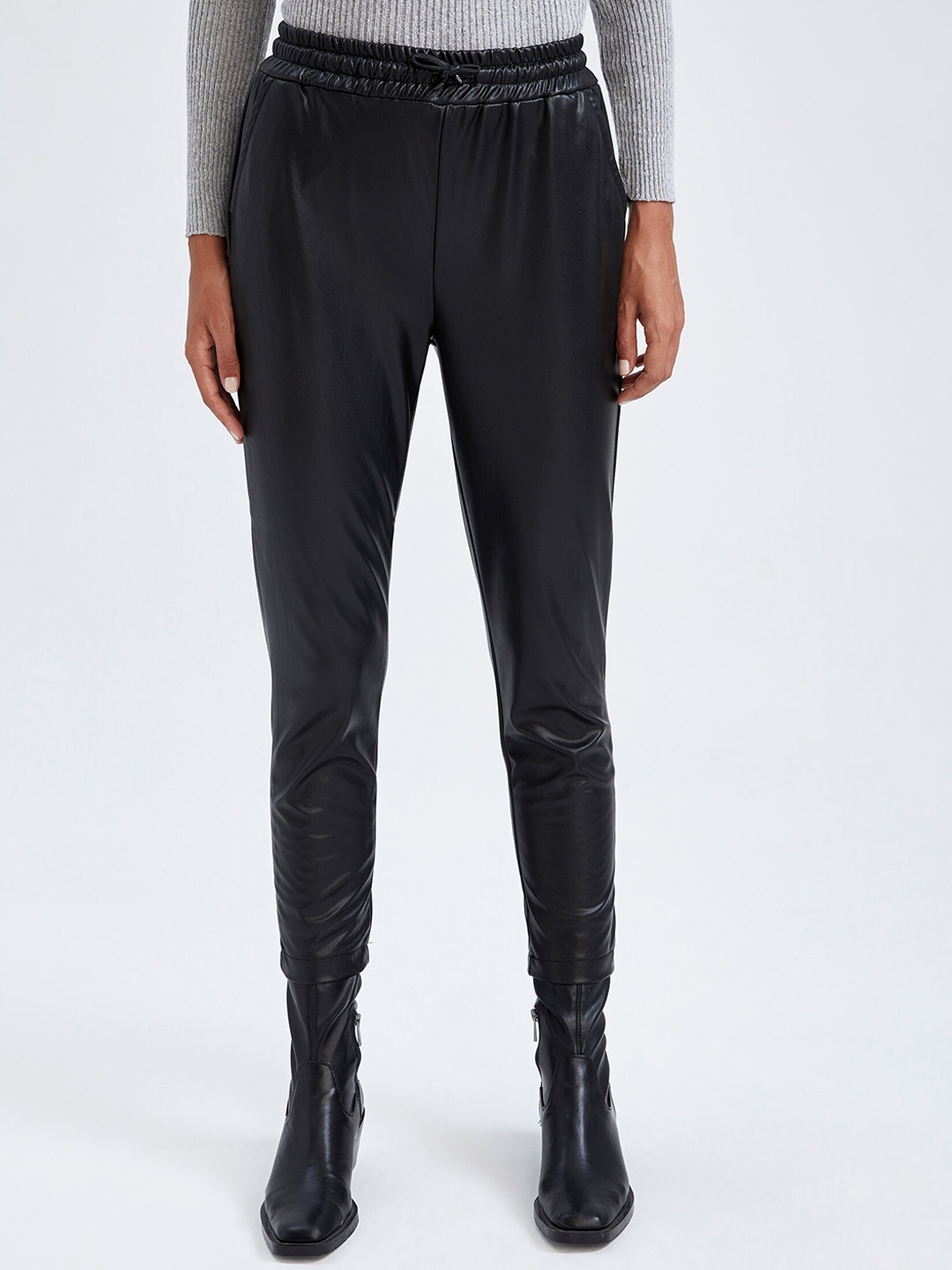 

DeFacto Women Black Solid Regular Trousers