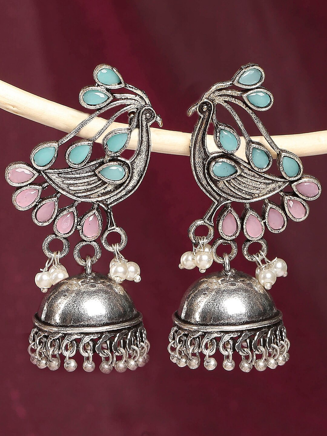 

OOMPH Silver-Toned Dome Shaped Jhumkas Earrings