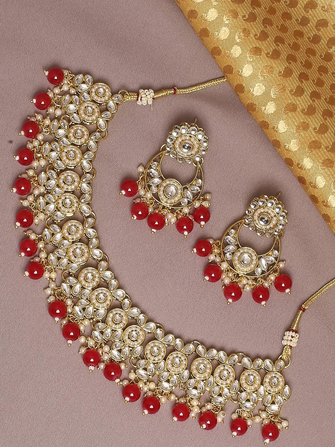 

OOMPH Gold-Toned & White Kundan Studded & Pearls Beaded Jadau Jewellery Set
