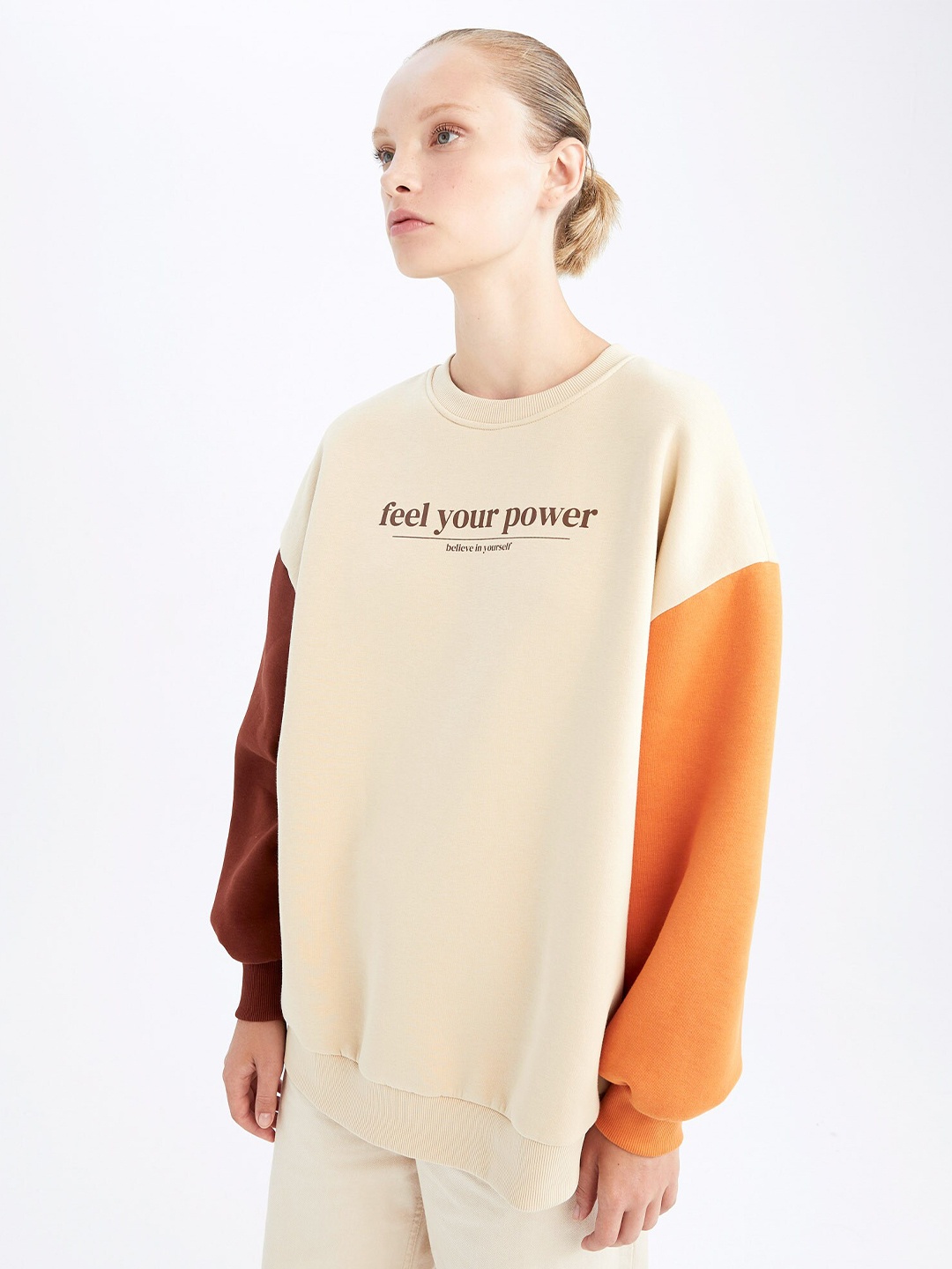 

DeFacto Women Cream-Coloured & Brown Solid Sweatshirt