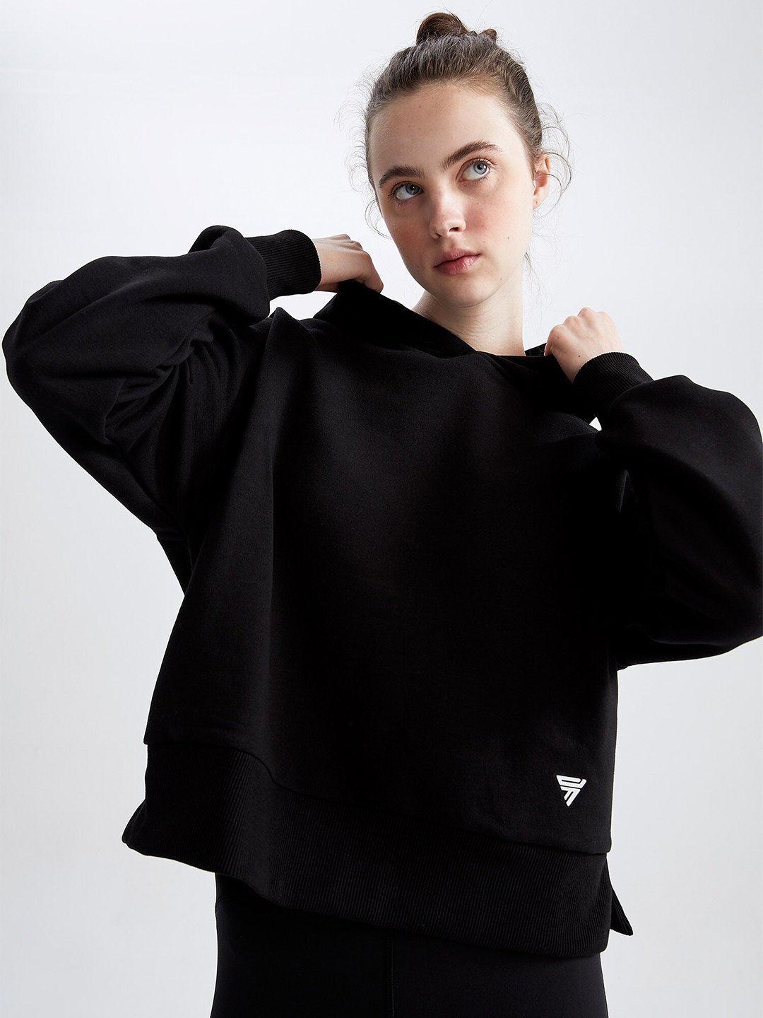 

DeFacto Women Black Solid Hooded Sweatshirt