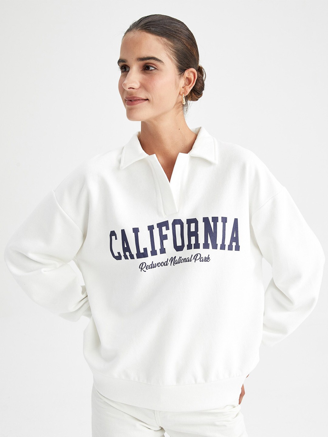

DeFacto Women White Printed Sweatshirt