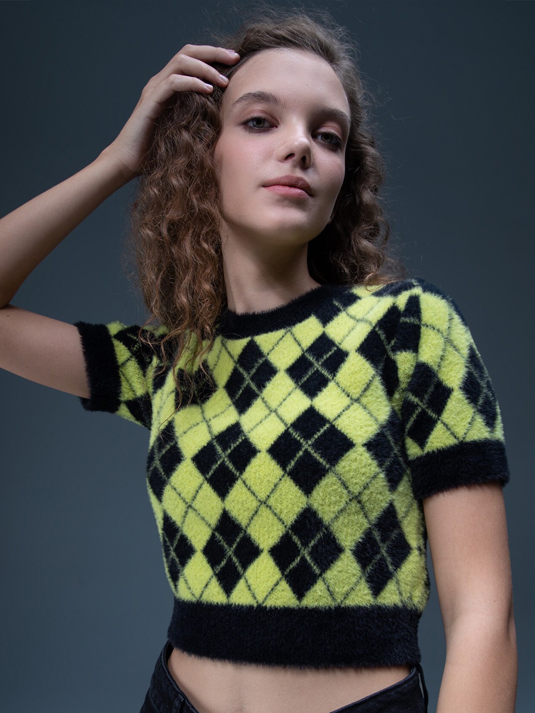 

DeFacto Women Green & Black Printed Polyester PU Coated Crop Pullover