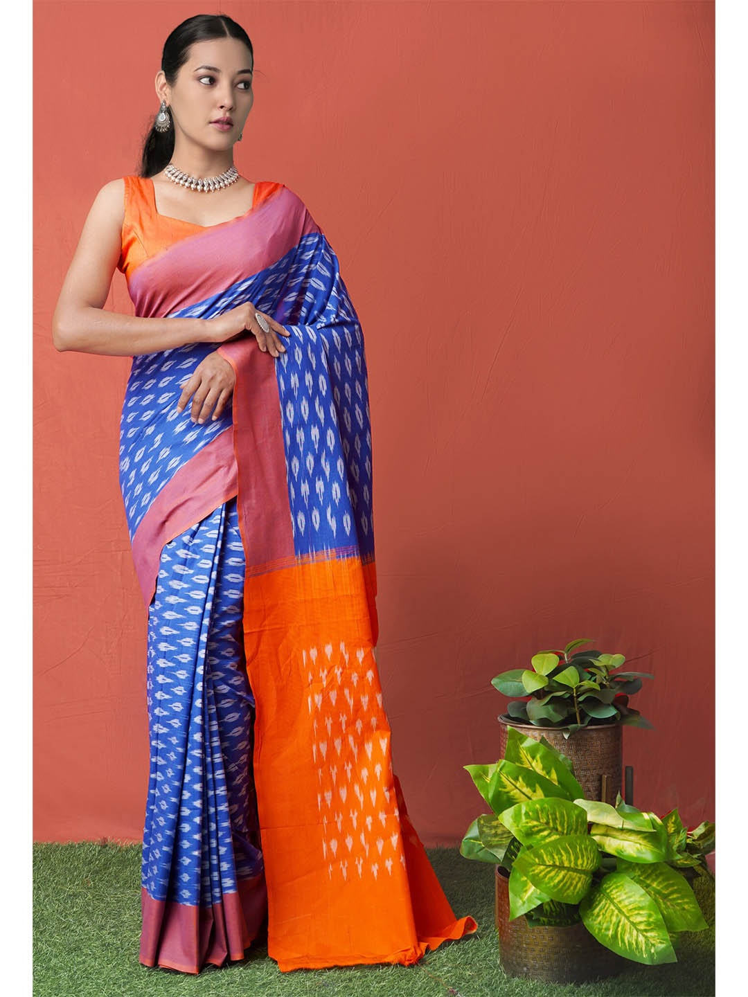 

Unnati Silks Women Blue & Orange Pure Cotton Pochampally Saree