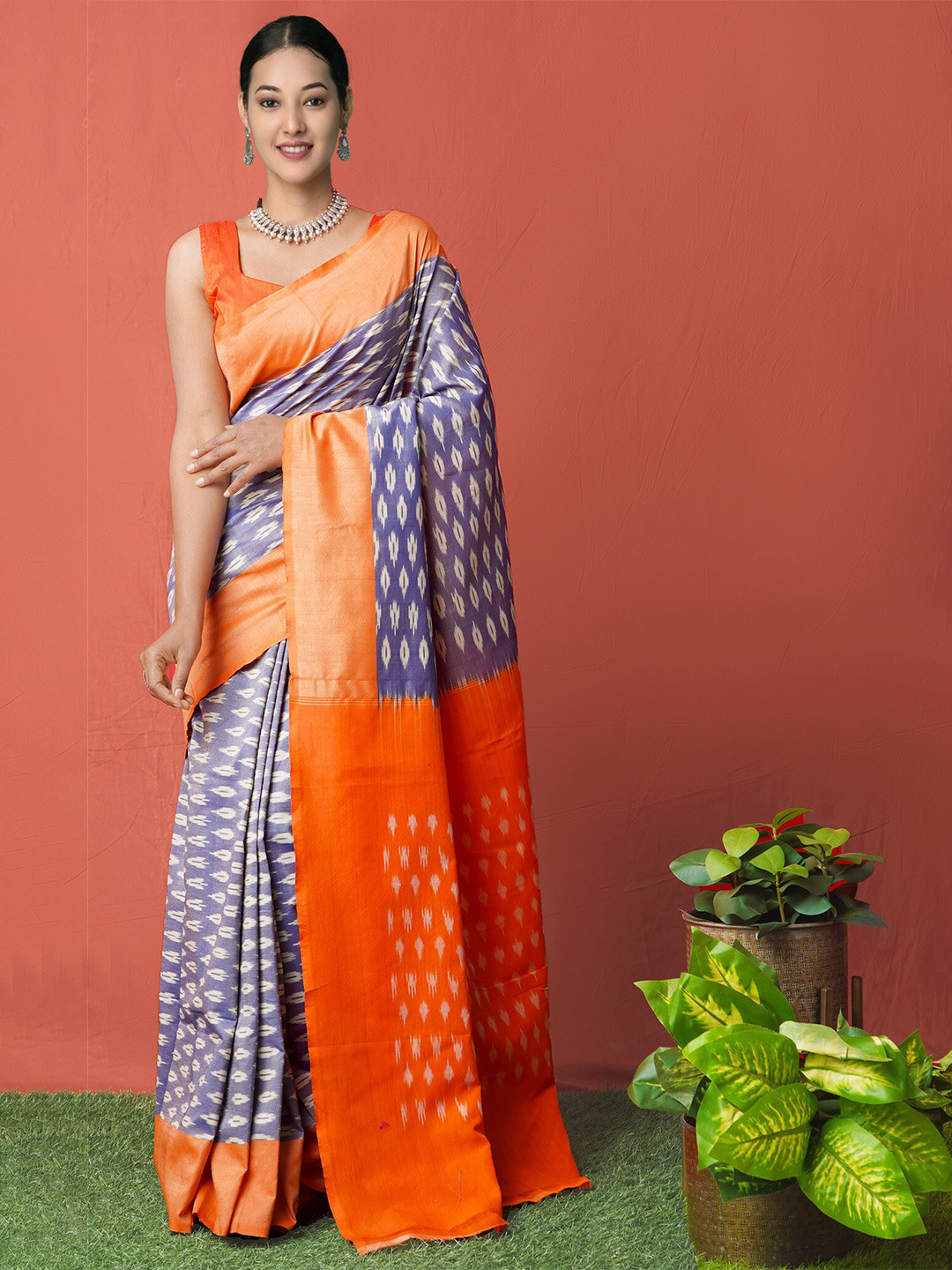 

Unnati Silks Blue & Orange Pure Cotton Pochampally Saree