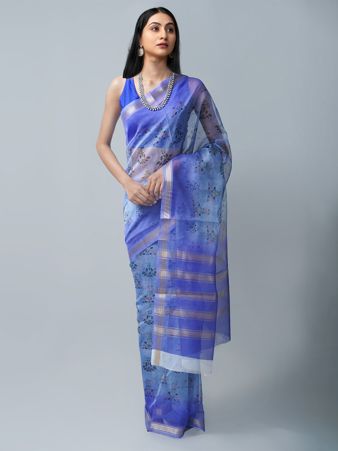 

Unnati Silks Blue & Silver-Toned Floral Zari Organza Block Print Saree