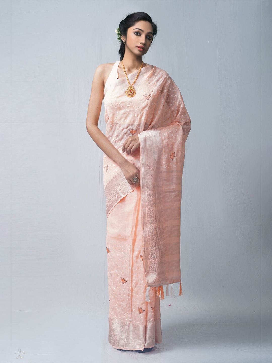 

Unnati Silks Orange & Off White Floral Embroidered Pure Linen Jamdani Saree