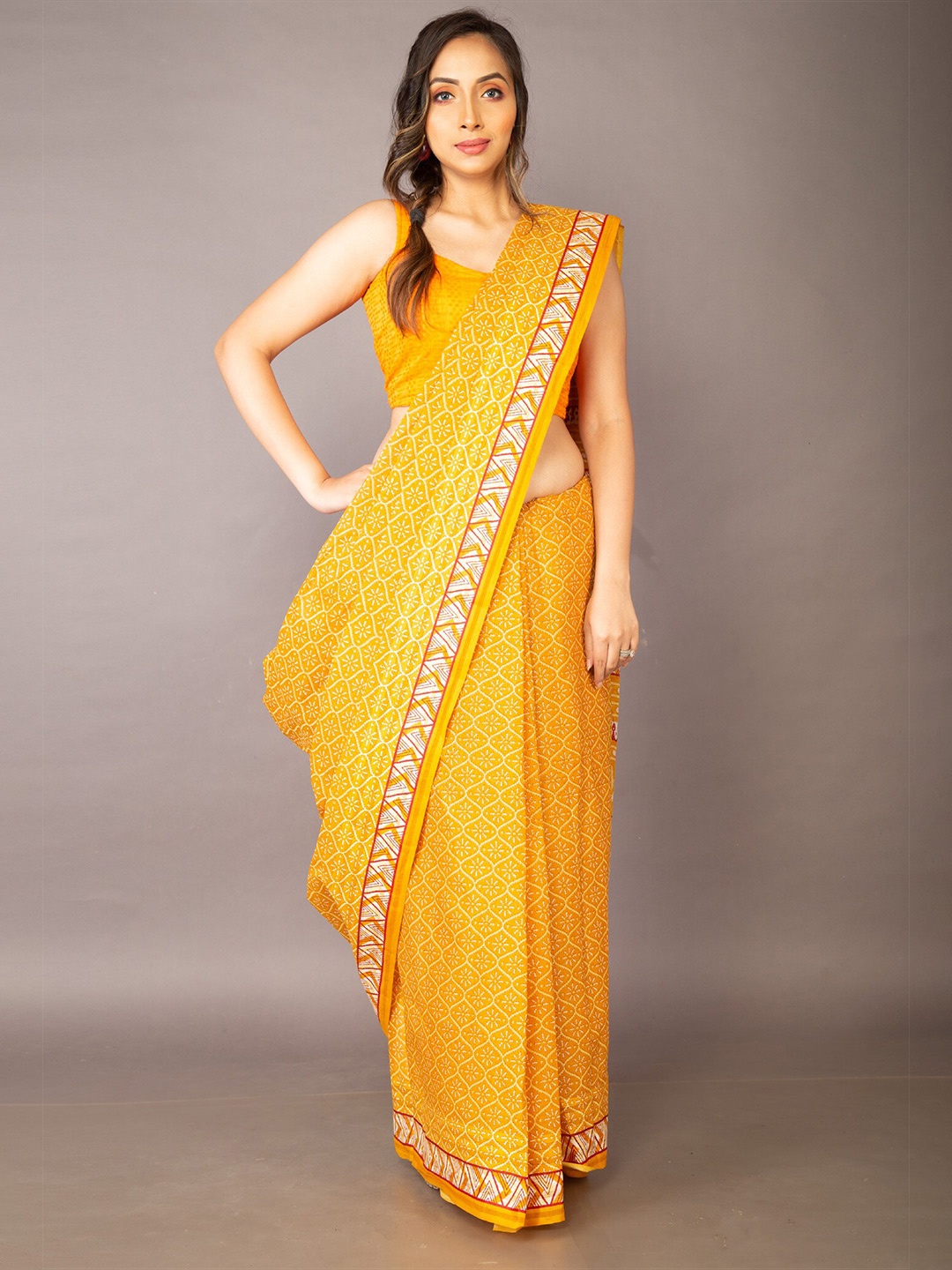 

Unnati Silks Yellow & White Floral Pure Cotton Kovai Saree