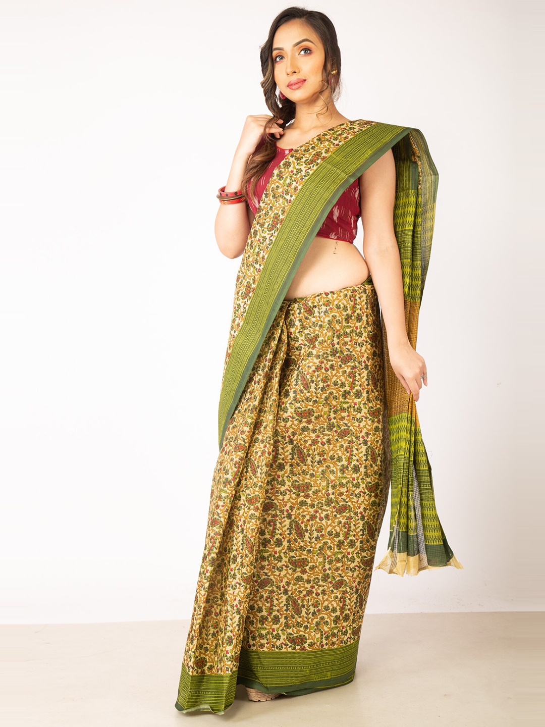 

Unnati Silks Brown & Green Floral Pure Cotton Kovai Saree