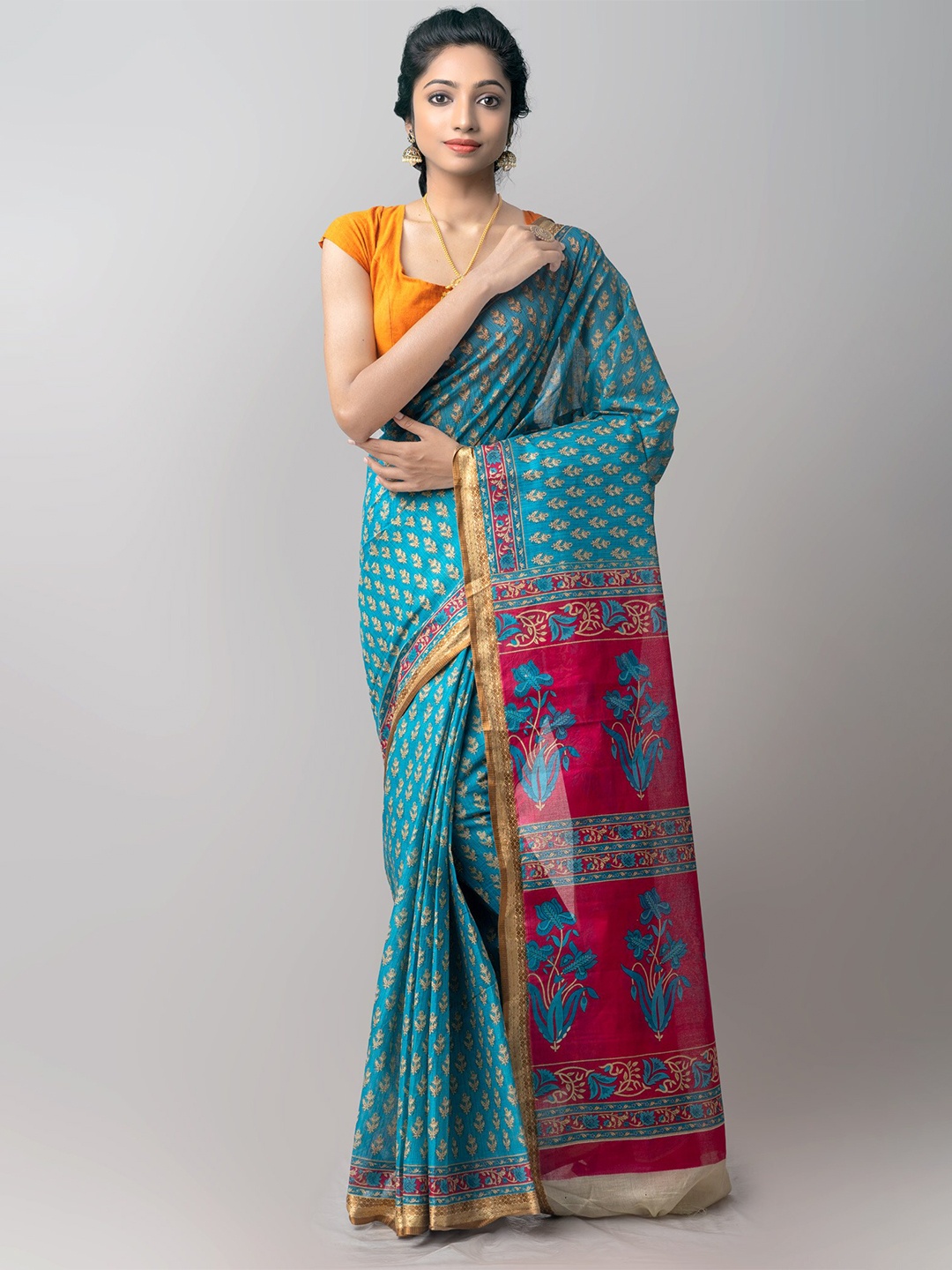 

Unnati Silks Blue & Pink Ethnic Motifs Zari Pure Cotton Kovai Saree