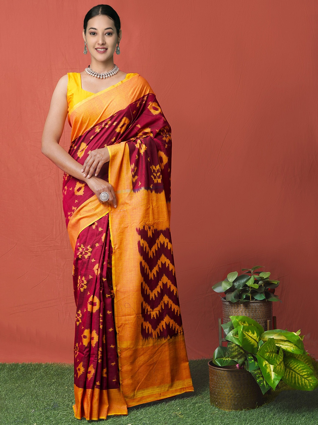 

Unnati Silks Purple & Orange Zari Silk Cotton Pochampally Saree
