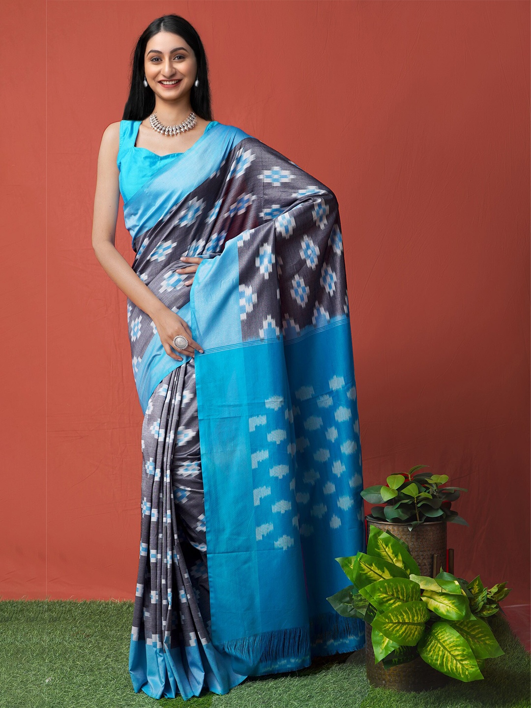 

Unnati Silks Grey & Blue Pure Cotton Pochampally Saree