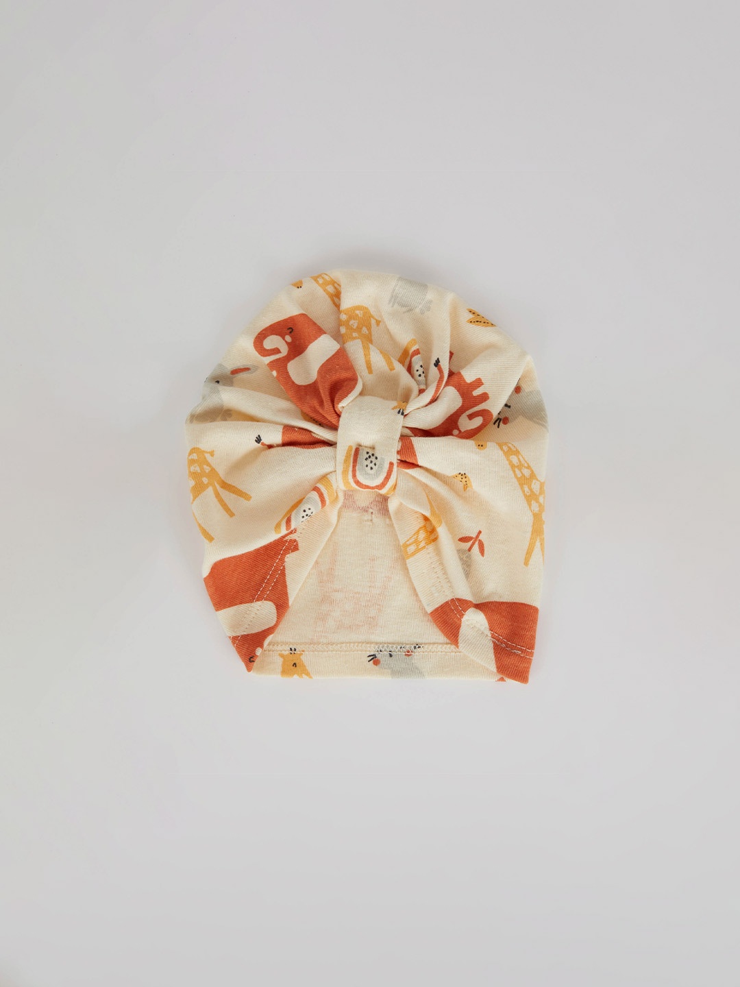 

DeFacto Girls Cream-Coloured & Orange Printed Cotton Beanie