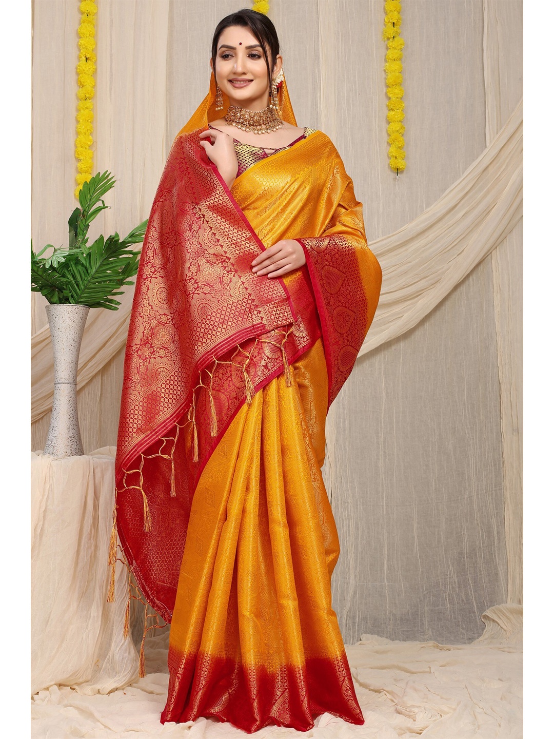 

Anaita Yellow & Red Ethnic Motifs Zari Pure Silk Banarasi Saree