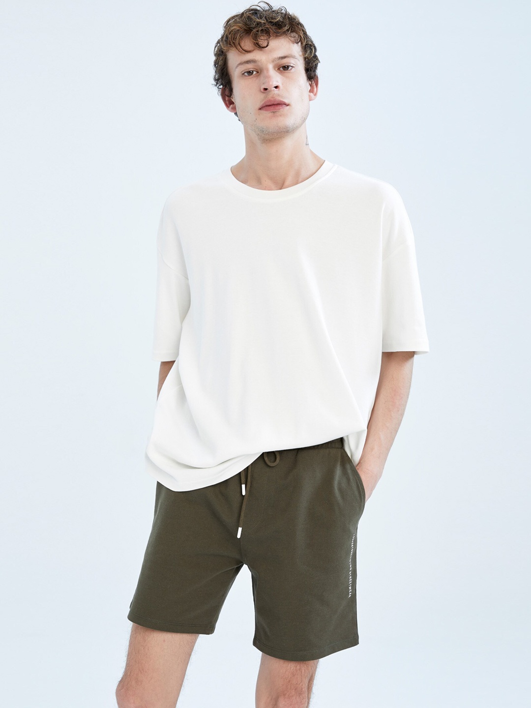 

DeFacto Men Olive Green Solid Sports Short