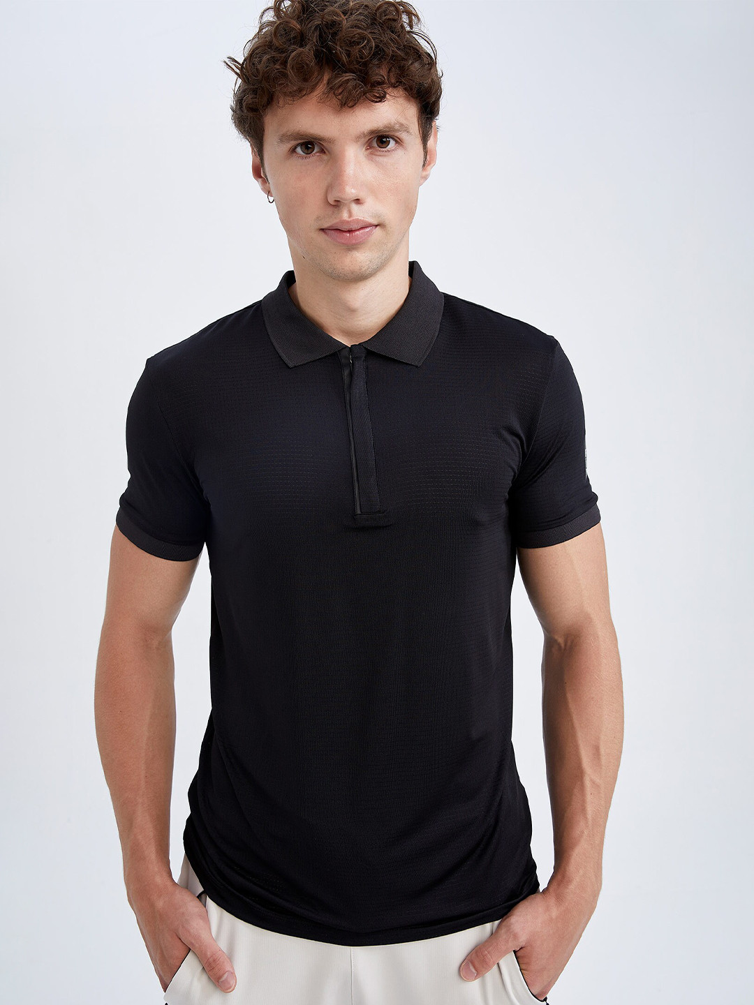 

DeFacto Men Black Solid Polo Collar Polyester T-shirt