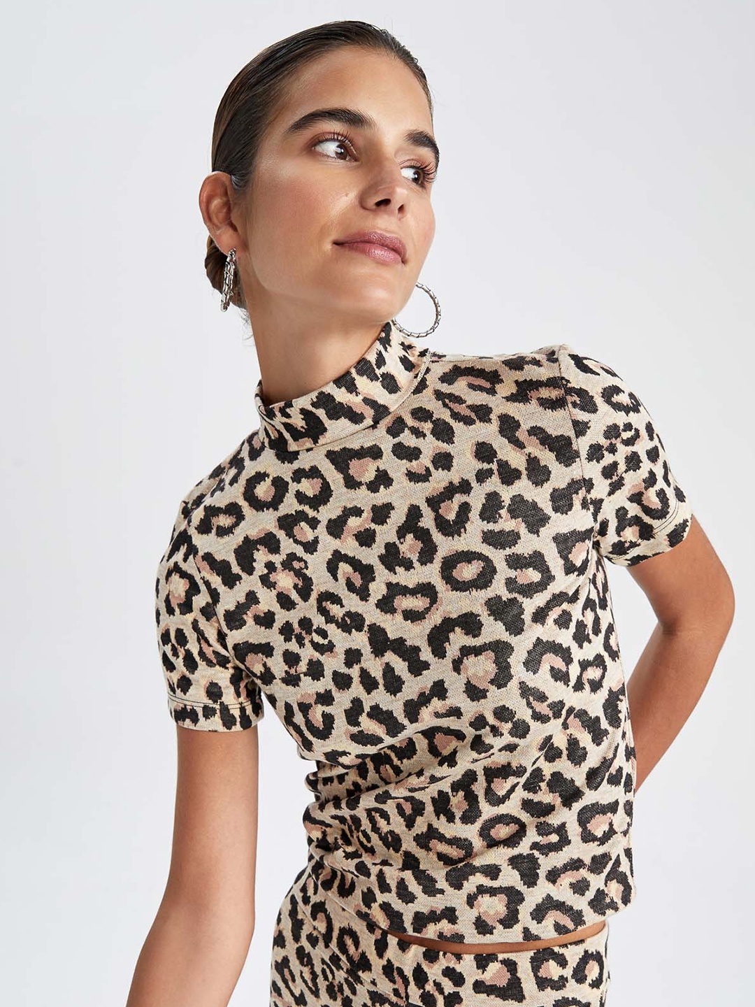 

DeFacto Black & Beige Animal Printed High Neck Top