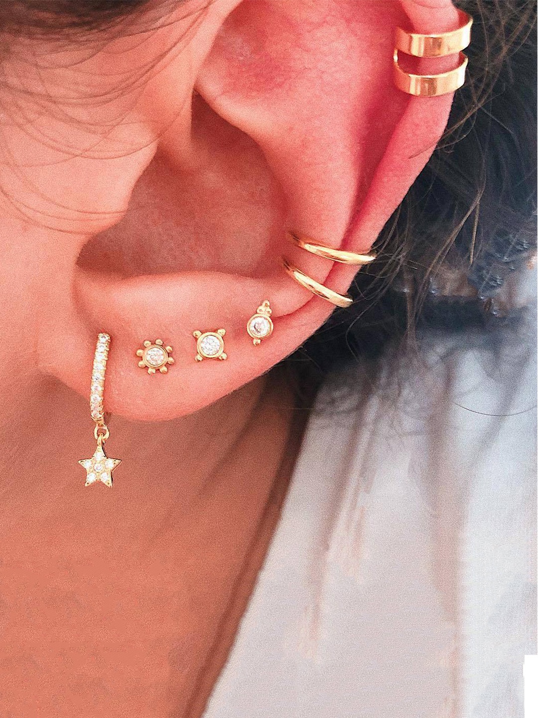

Unwind by Yellow Chimes Gold-Toned Set of 7 Contemporary Ear lobe Studs Earrings