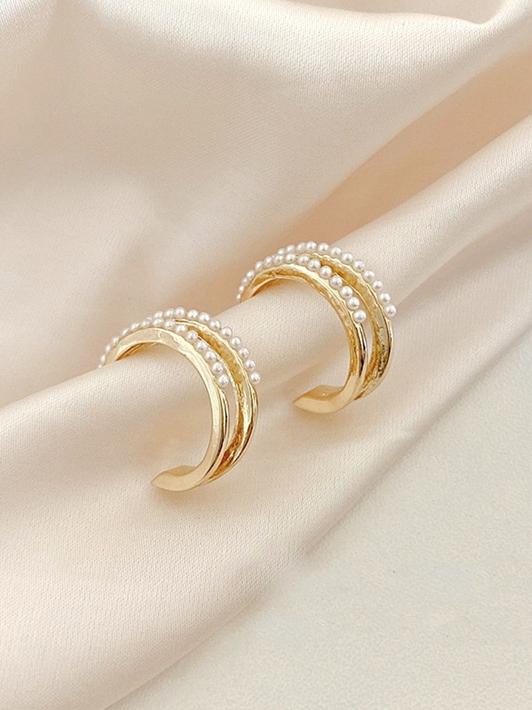 

Yellow Chimes Gold-Toned Triple Layered Crystal Studded Half Hoop Earrings