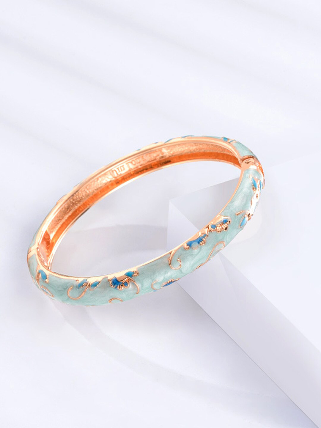 

Yellow Chimes Women Gold Plated Hand Cuff Kadaa Bracelet, Blue