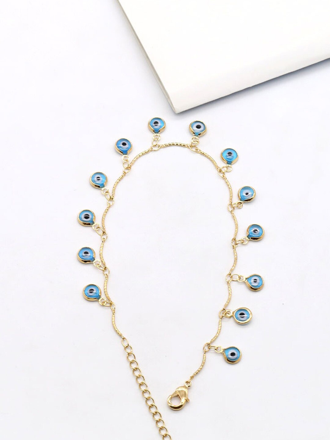 

Yellow Chimes Gold-Plated Multilayer Chain Evil Eye Studded Adjustable Anklet