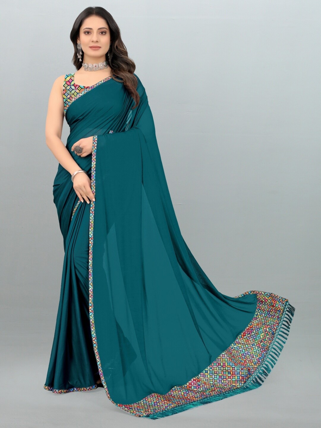 

APNISHA Teal Blue & Pink Printed Saree