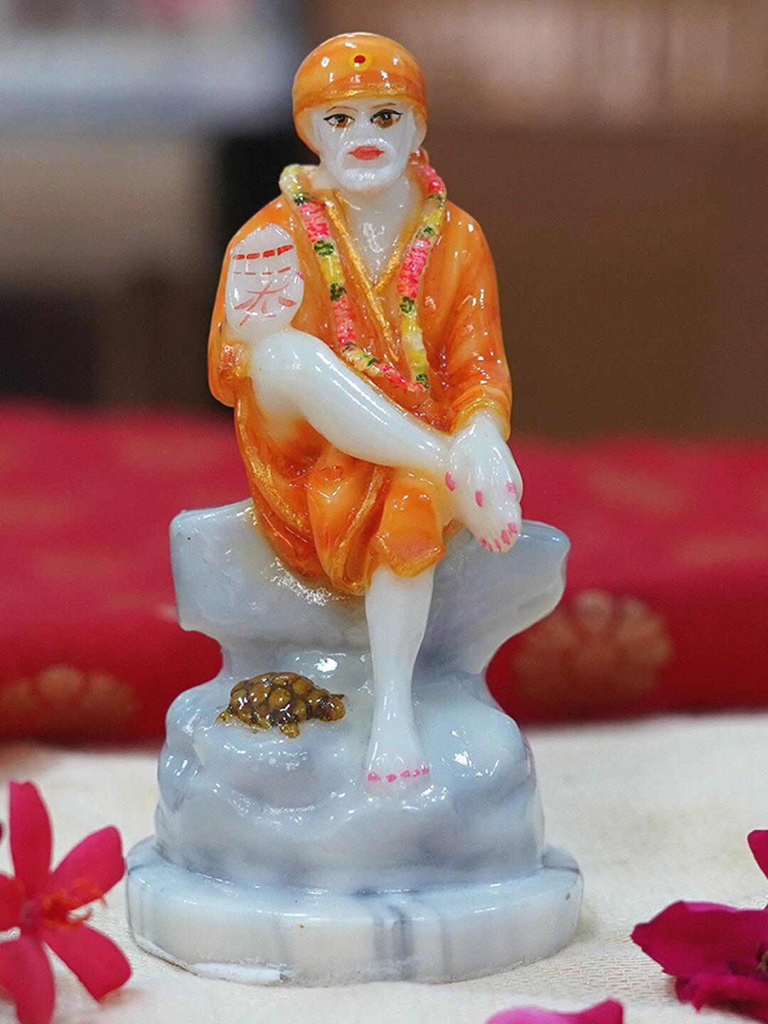 

Gallery99 Yellow Sai Baba Showpieces