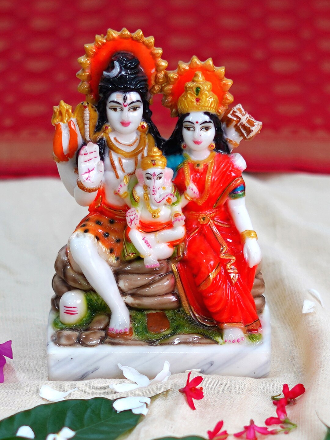 

Gallery99 Cream Colored & Orange Colored Shiv Parivar Idol Showpieces