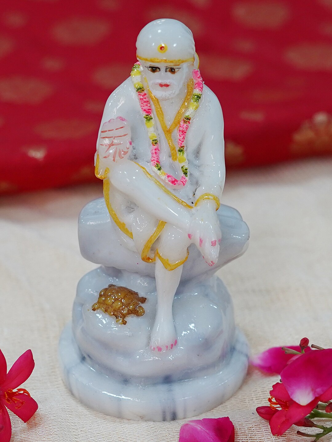 

Gallery99 White & Gold-Toned Sai Baba Idol Showpiece