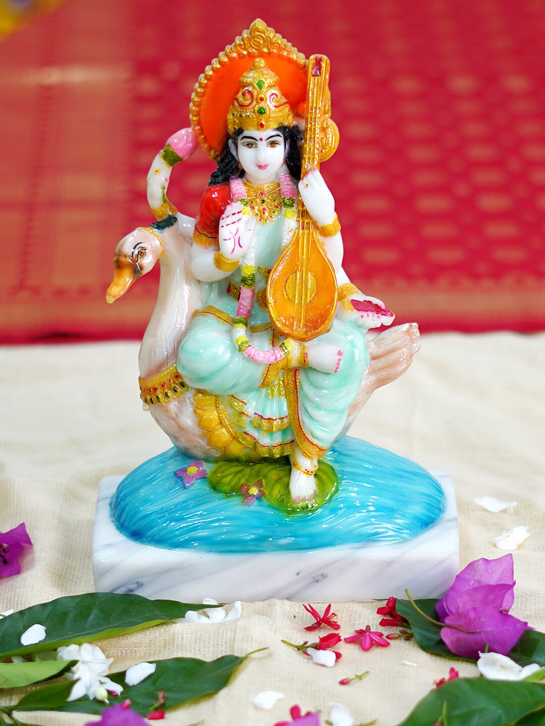 

Gallery99 Blue Saraswati Handpainted Idol Showpiece