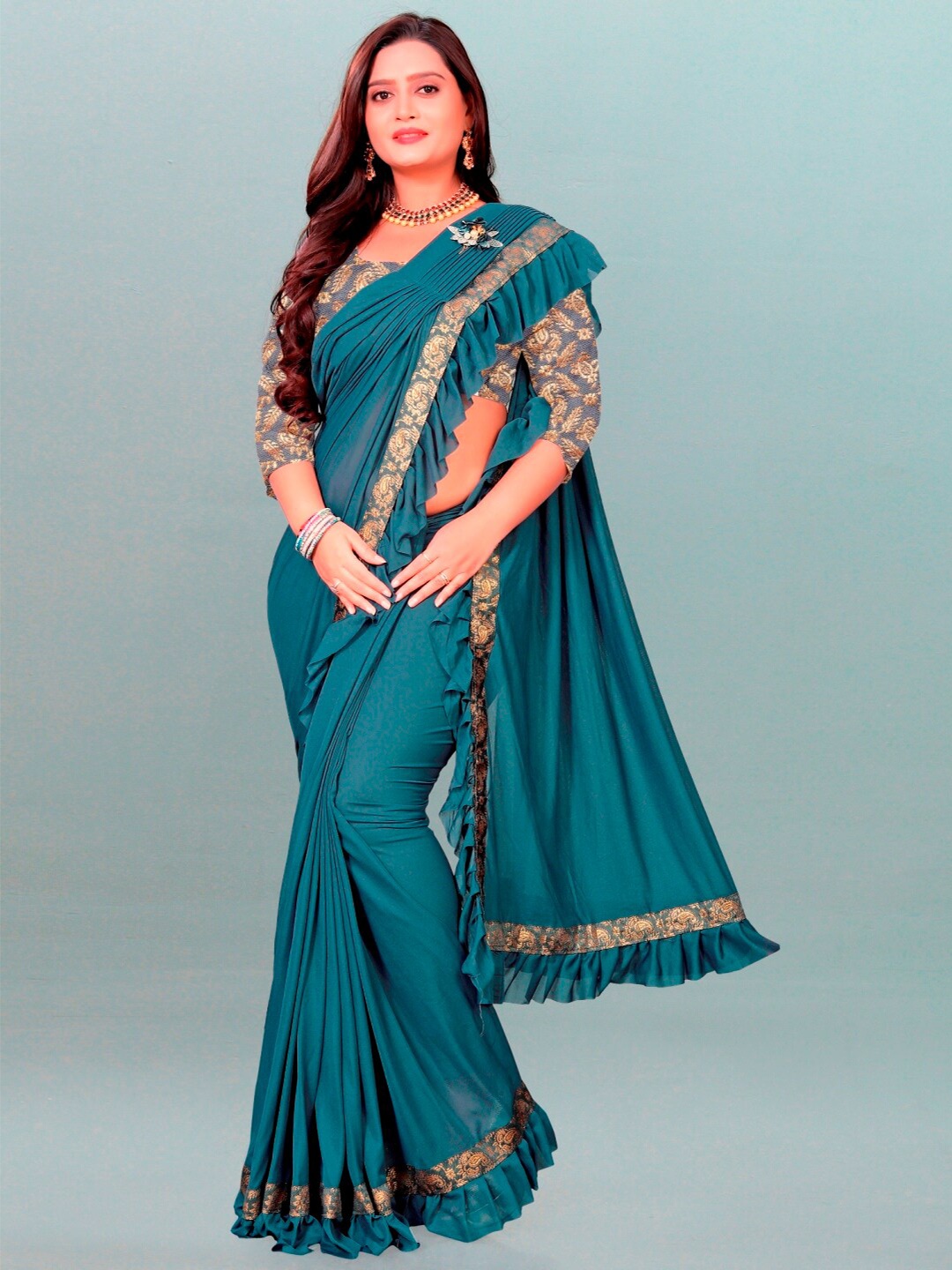 

APNISHA Women Blue & Grey Embroidered Lycra Saree