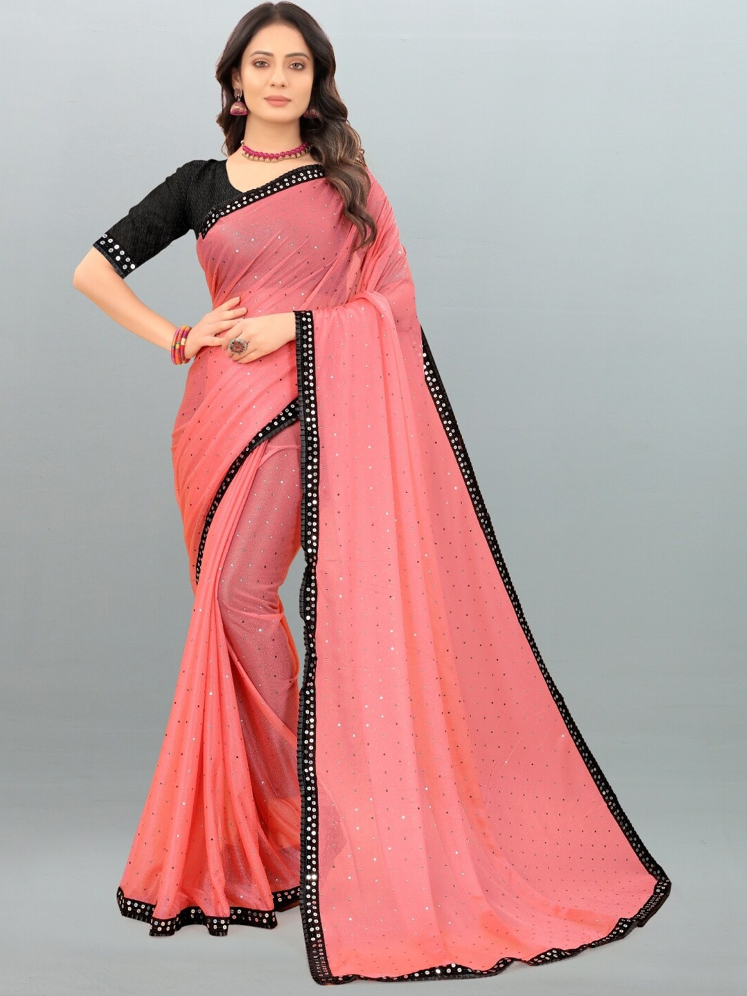 

APNISHA Peach-Coloured & Black Embellished Sequinned Saree