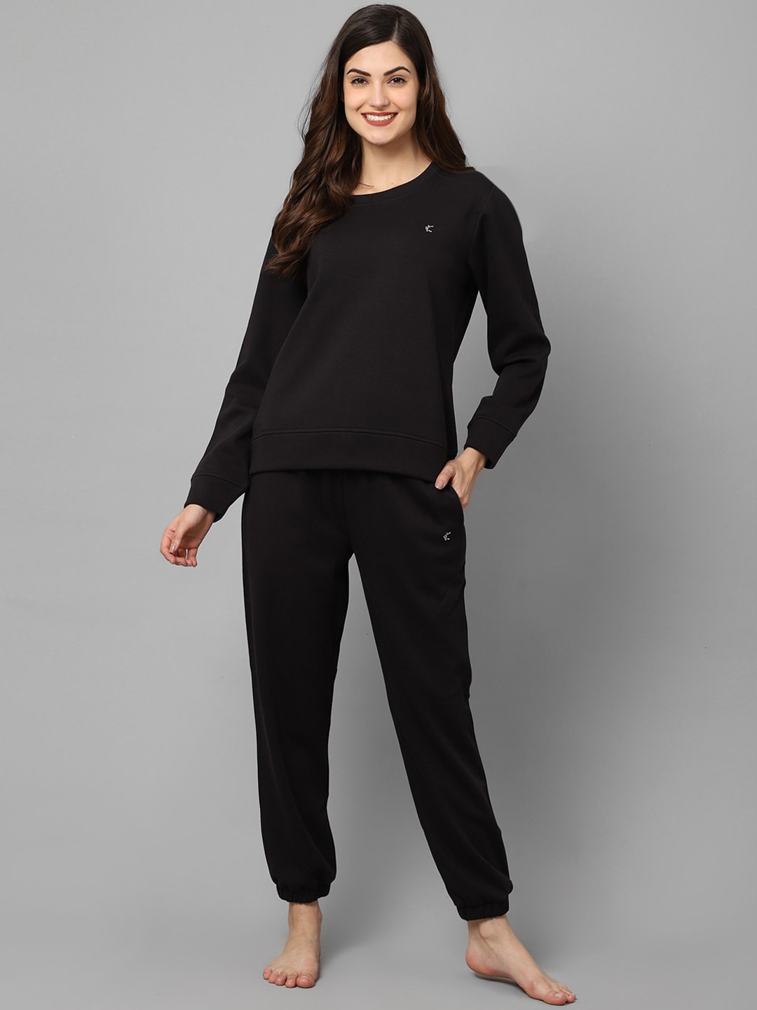 

Kanvin Women Black Solid Night Suit