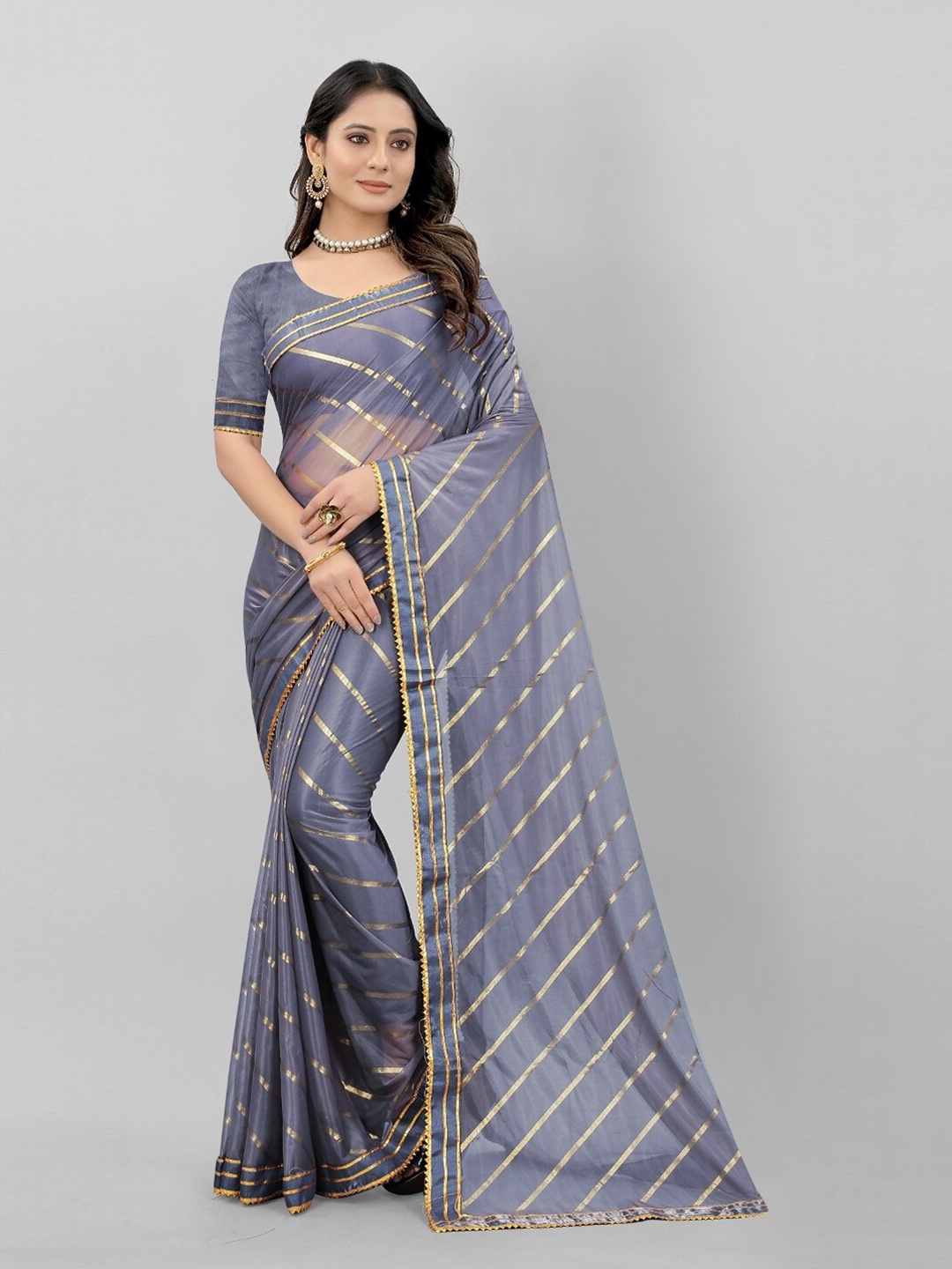 

APNISHA Grey & Gold-Toned Striped Zari Saree