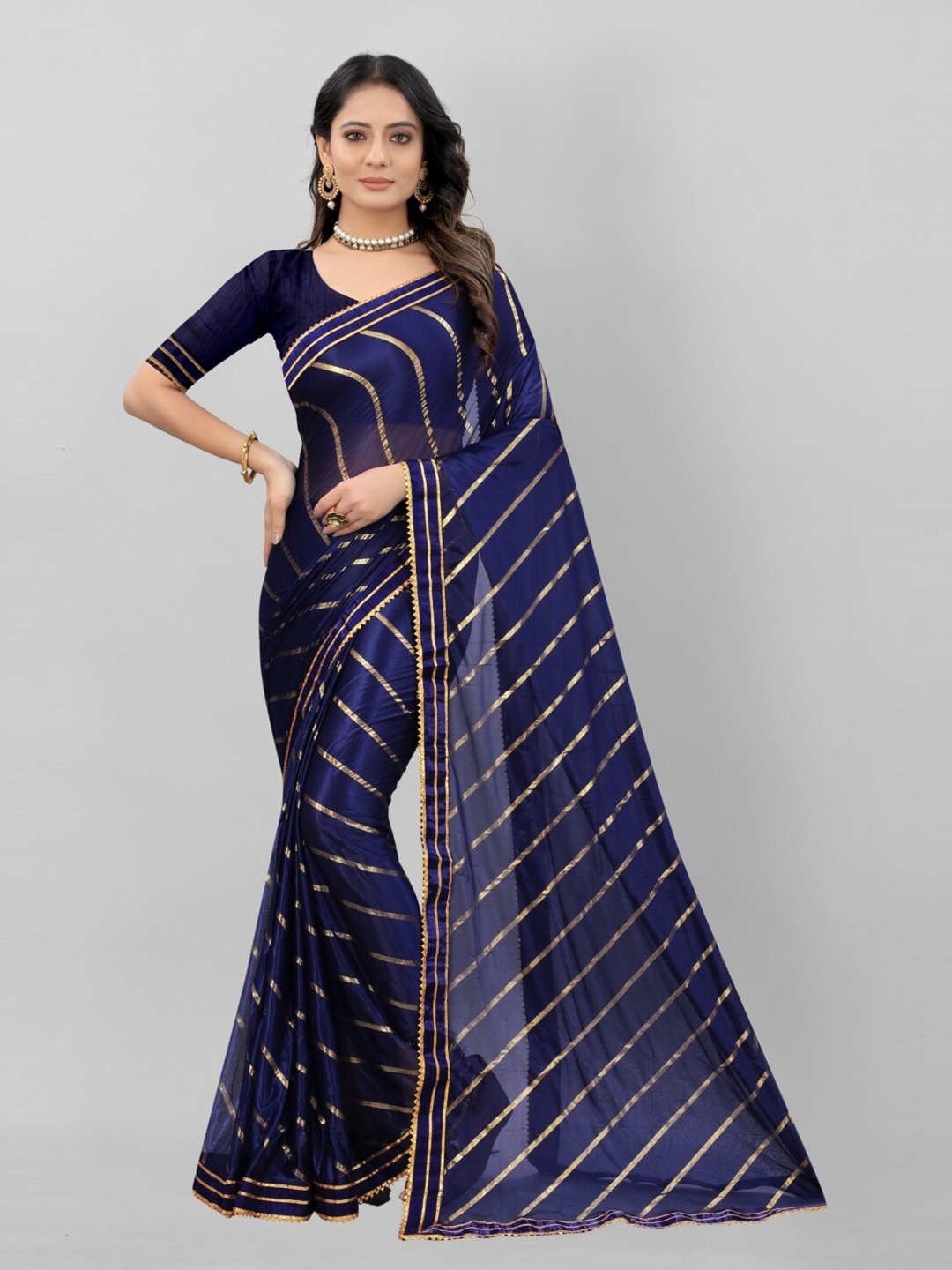 

APNISHA Navy Blue & Gold-Toned Striped Zari Saree