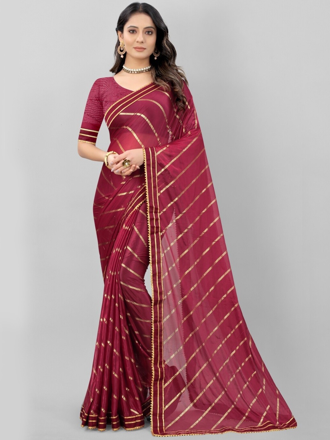 

APNISHA Maroon & Gold-Toned Embellished Saree