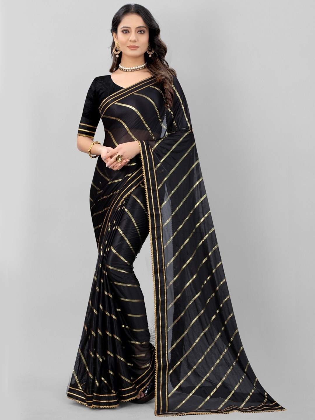 

APNISHA Black & Gold-Toned Leheriya Saree