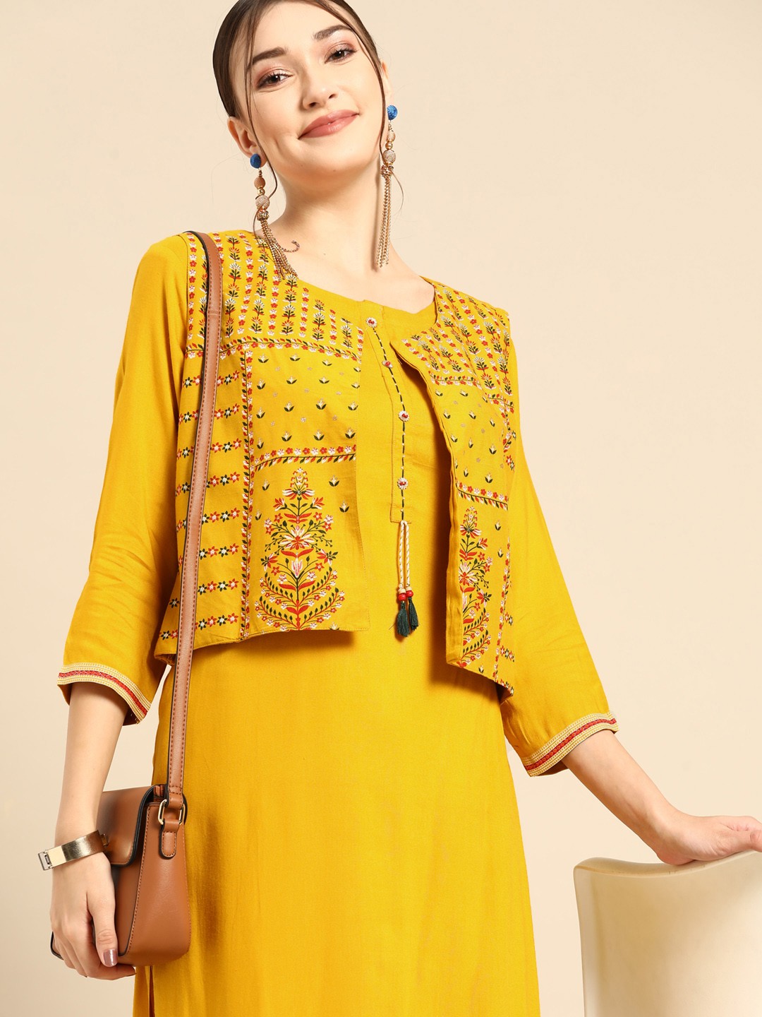 

Sangria Women Mustard Yellow Layered Sequinned Kurta with Trousers & Printed Ethnic Jacket