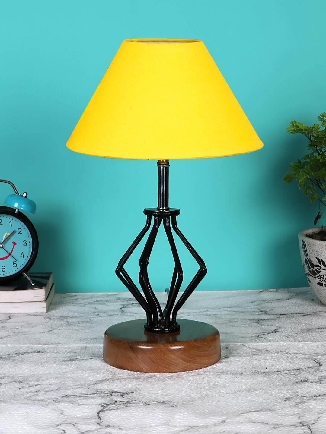 

Devansh Yellow Solid Table Lamp