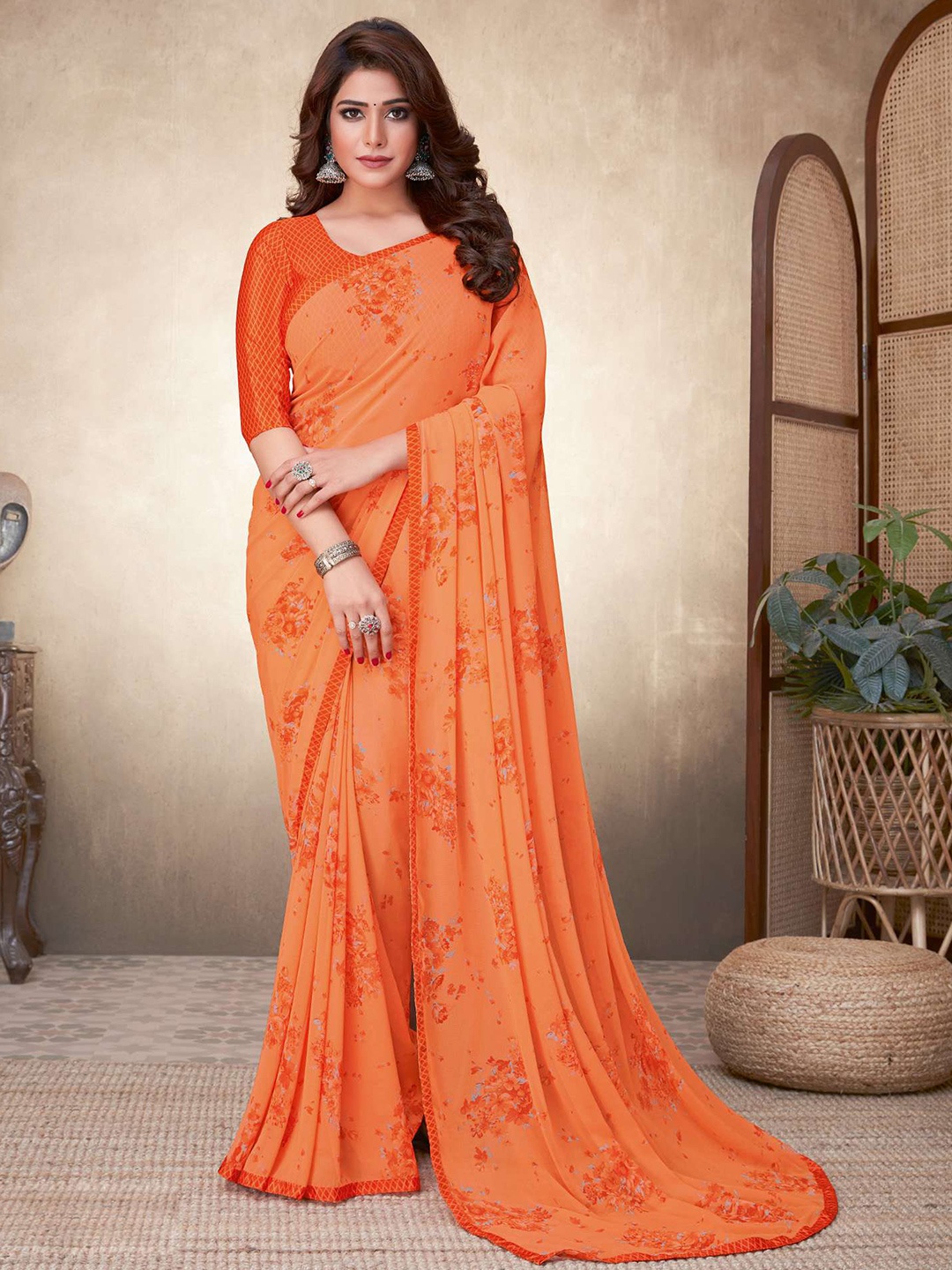 

Satrani Women Orange Floral Poly Georgette Saree